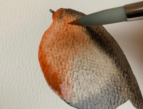 Pinceau peignant un oiseau à l’aquarelle