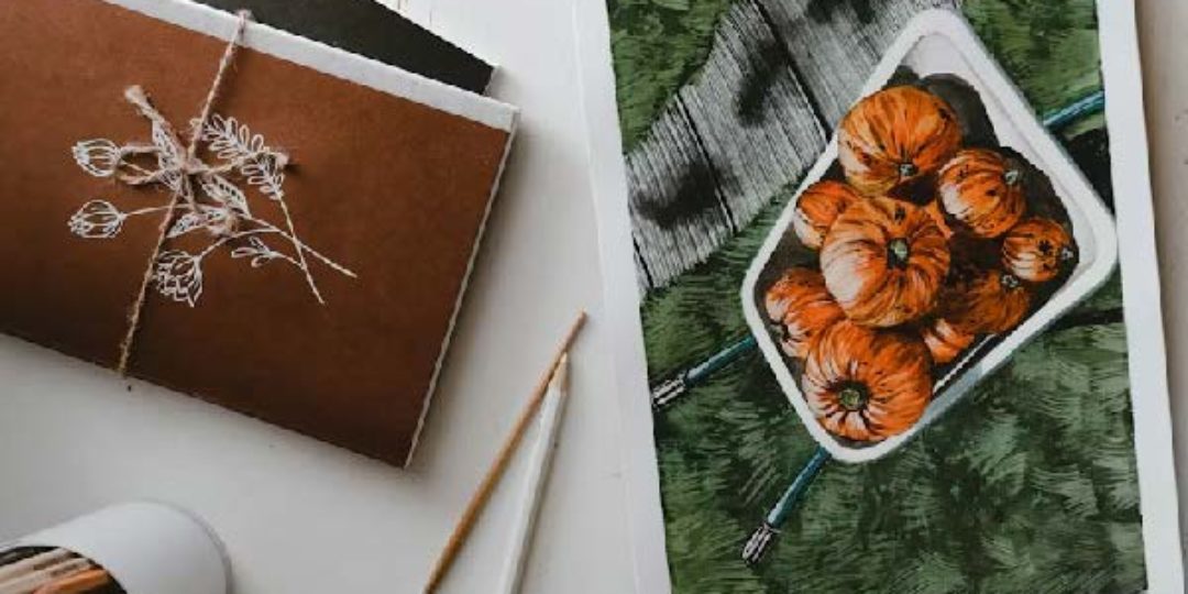 Illustration à l'aquarelle de citrouilles réalisée lors d'un atelier créatif sur le thème de l'automne.
