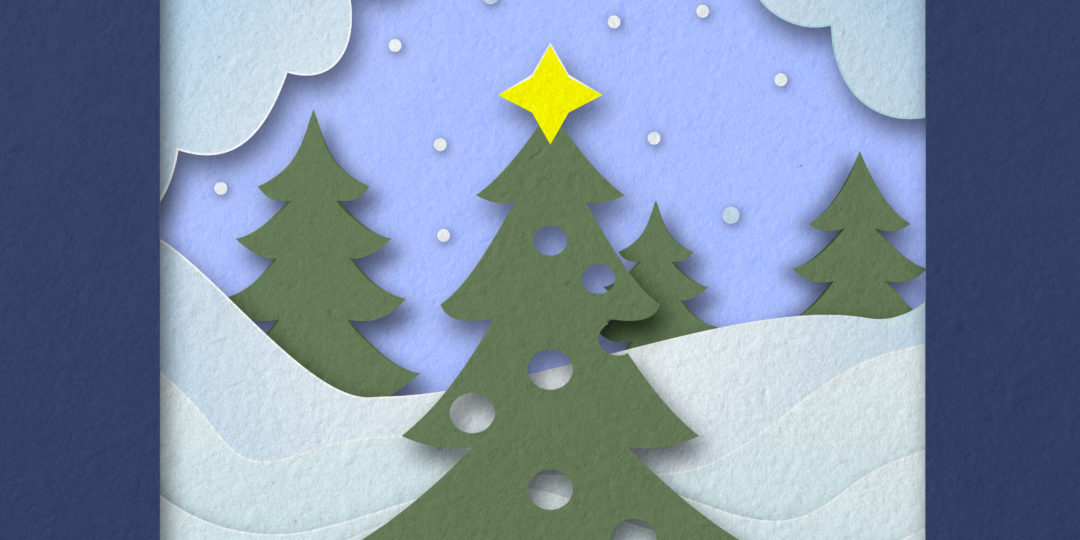 Carte pop-up de Noël en papier représentant un sapin dans un paysage enneigé, réalisée lors d'un atelier créatif.