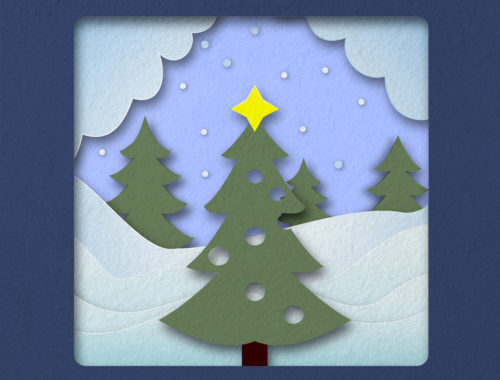Carte pop-up de Noël en papier représentant un sapin dans un paysage enneigé, réalisée lors d'un atelier créatif.
